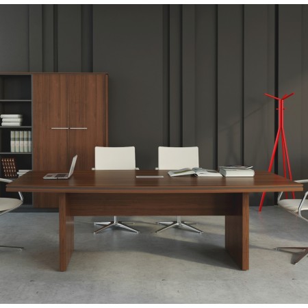 Table de conférence en bois foncé dans un bureau avec armoire de rangement