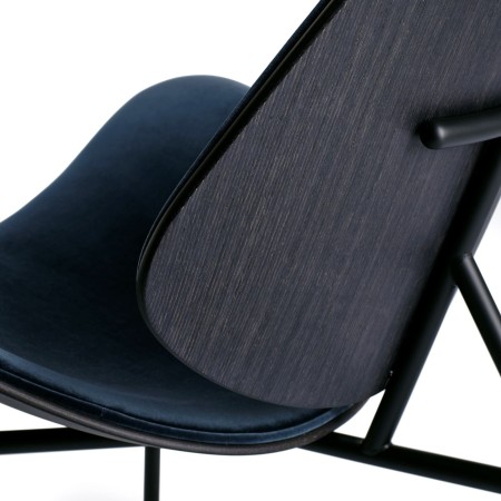 Dos en bois teinté du fauteuil KRAM tissu et acier - modernité salle d'attente