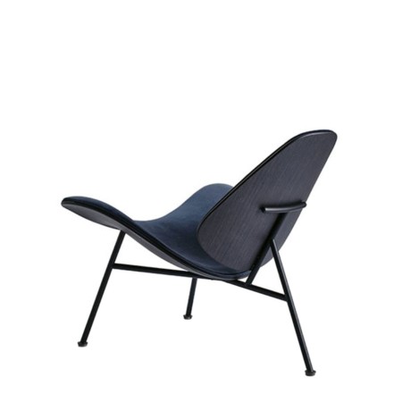 Fauteuil KRAM recouvert de tissu et pieds en acier - confort raffiné et style