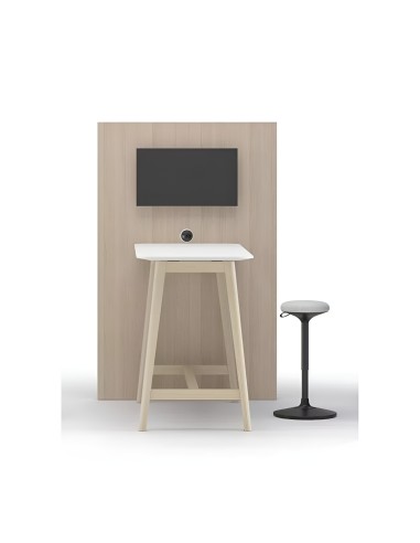 Chaise haute devant table blanche avec piètement en bois clair et écran intégré au panneau