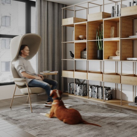 Fauteuil Epocc Lounge en tissu beige dans un salon moderne avec mur vert – Epocc Lounge