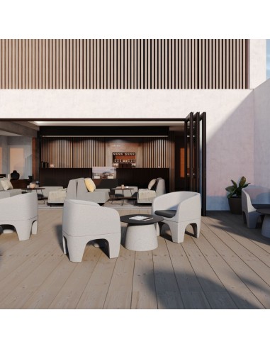 Fauteuils Gummy Bear autour d’une table basse dans un espace de détente – Gummy Bear