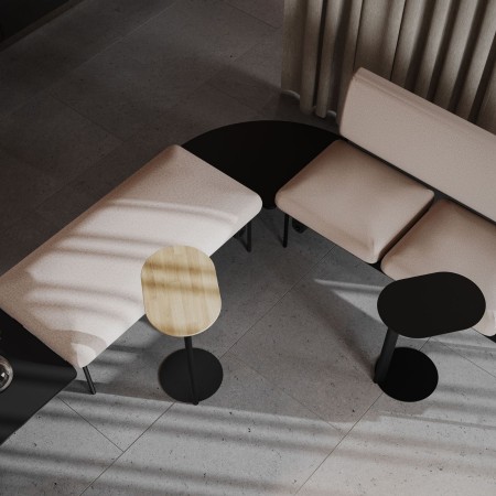 Banquette accompagnée de tables basses cylindriques – Fora Care