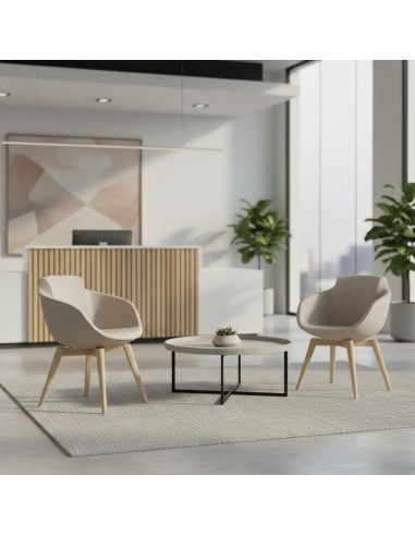 Fauteuils TULA design jaune et bleu avec pieds bois autour d’une table ronde