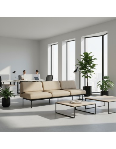 Canapé trois places beige dans un espace de travail lumineux et moderne. - Fora Office