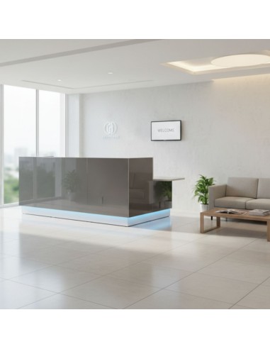 Meuble de réception gris avec partie plus basse PMR dans espace d'accueil lumineux