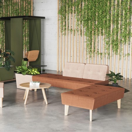 Espace détente moderne avec assises pastel et ambiance douce. - U Floe