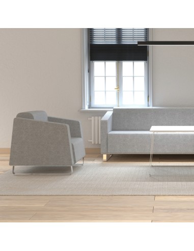 Espace détente clair avec canapé bas et mobilier minimal. - Voo Voo