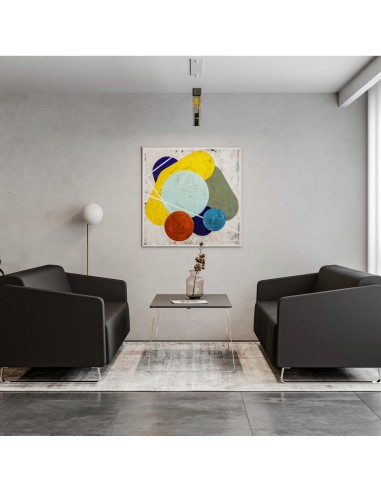Salon professionnel avec fauteuils noirs et tableau coloré. - Voo Voo