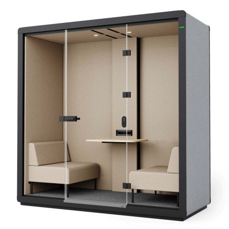 Cabine Flathouse avec deux fauteuils et une table centrale pour réunions. - Flathouse