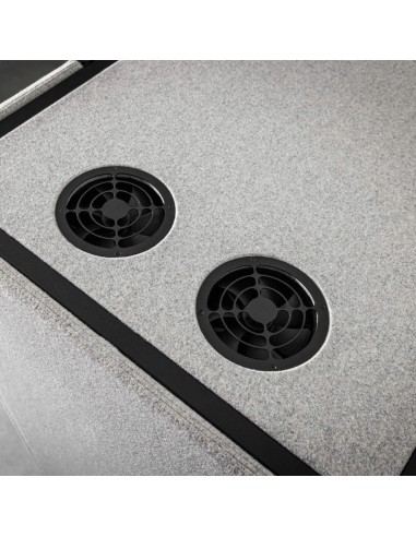 Détail des grilles de ventilation intégrées dans la cabine acoustique Quadra. - Quadra