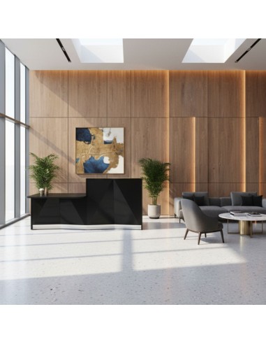 Meuble de réception noir brillant avec accès PMR dans espace d'accueil avec fauteuil et table basse