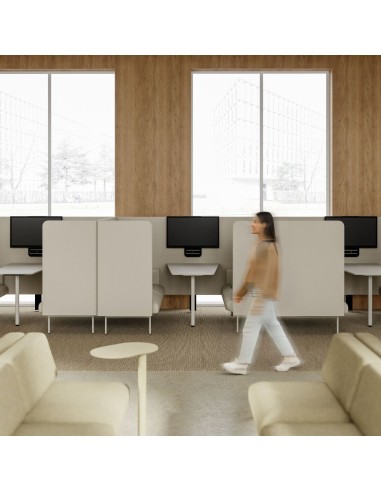 Modules Fora disposés en face à face dans un espace détente avec fauteuils et tables basses. - Fora