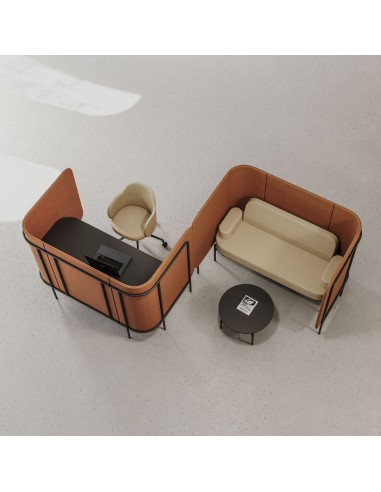 Ensemble de sièges Fora en finition beige avec structure ajourée noire, formant un coin lounge accueillant. - Fora