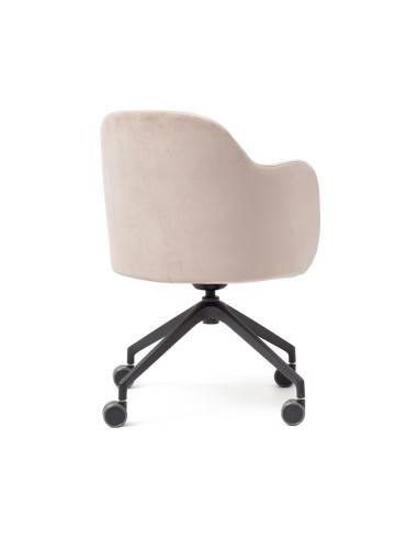 Vue de dos de la chaise blanche et douce Flos en blanc avec des accoudoirs pour longues journées de travail