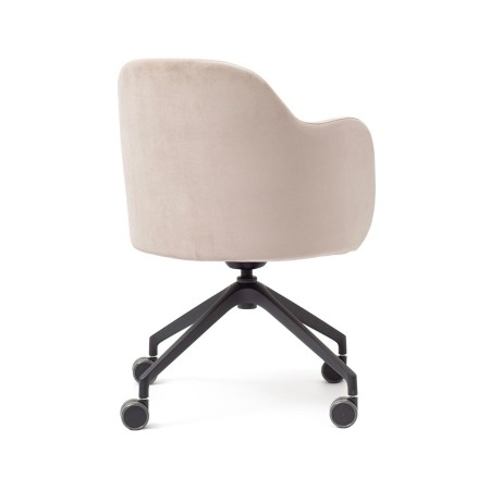 Vue de dos de la chaise blanche et douce Flos en blanc avec des accoudoirs pour longues journées de travail