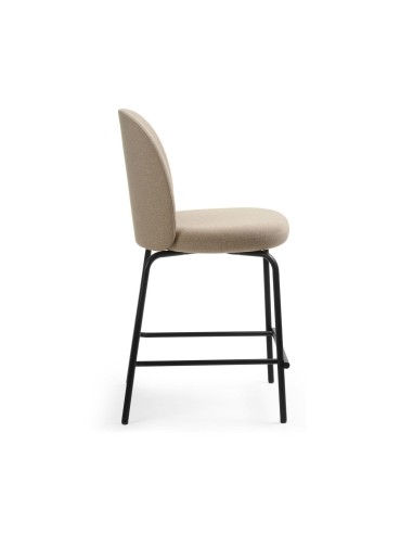 Vue de profil de la chaise haute pour comptoirs Flos avec dossier et assise confortable en tissu