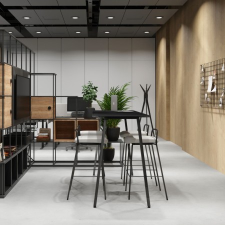 Salle de travail collaboratif en entreprise suisse avec chaises hautes confortables Momo noires