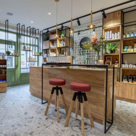 Tabouret de bar Spin SN W H bois massif et métal pour espace d'accueil suisse