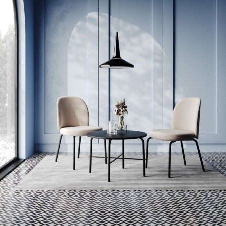 Table basse ronde dans salle d’attente moderne - Flos