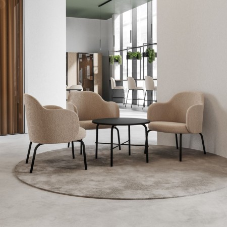 Table basse ronde près de canapé tissu - Flos