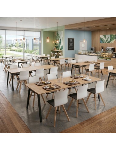 Table cantine professionnelle Orte avec porte-chaises dans cafétéria d’entreprise moderne à Lausanne.