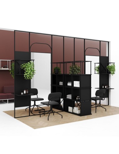 Séparation d’espace avec étagère Saar 4x4 et plantes dans un open space à Genève.