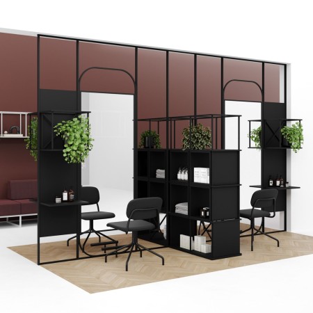 Séparation d’espace avec étagère Saar 4x4 et plantes dans un open space à Genève.