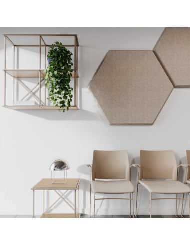 Étagères murales Saar Hang dans un espace d’accueil professionnel à Lausanne.