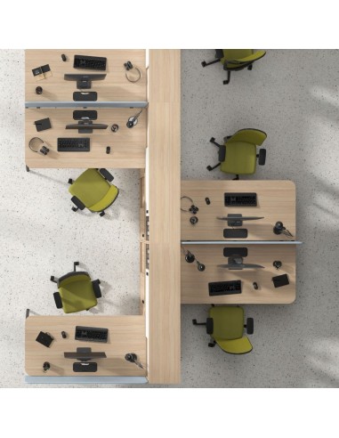 Vue du dessus d’un espace de travail partagé avec bureaux modulaires et chaises vertes ergonomiques ROUND.