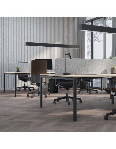 Bureaux bench NOVA U en open space dans des bureaux à Lausanne.