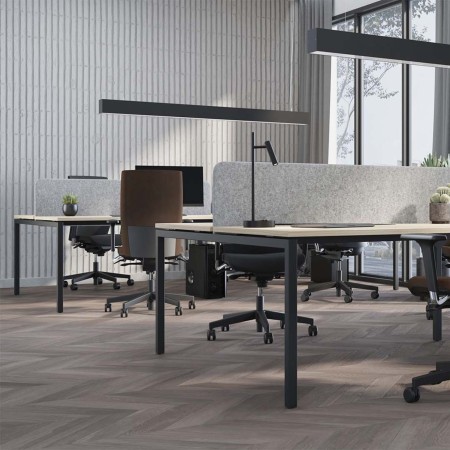 Bureaux bench NOVA U en open space dans des bureaux à Lausanne.