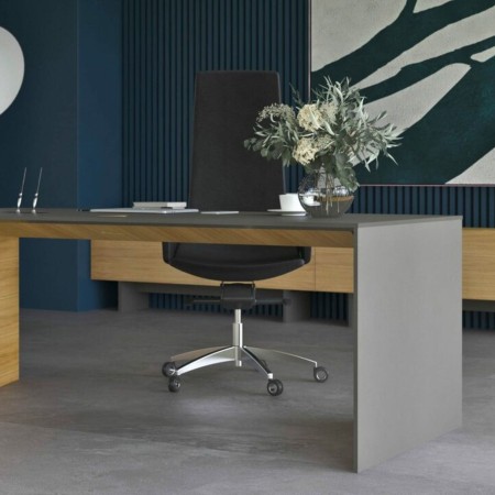 Bureau exécutif Move&Lead hauteur fixe dans un espace de direction à Lausanne.