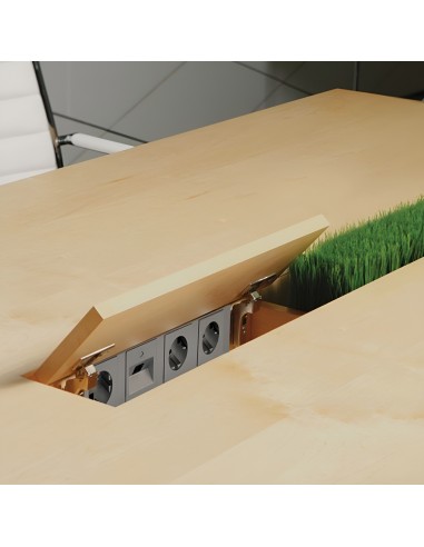 Bureau AIR Executive avec passe-câble intégré, bloc prises caché et compartiment ouvert.