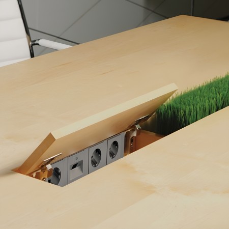 Bureau AIR Executive avec passe-câble intégré, bloc prises caché et compartiment ouvert.