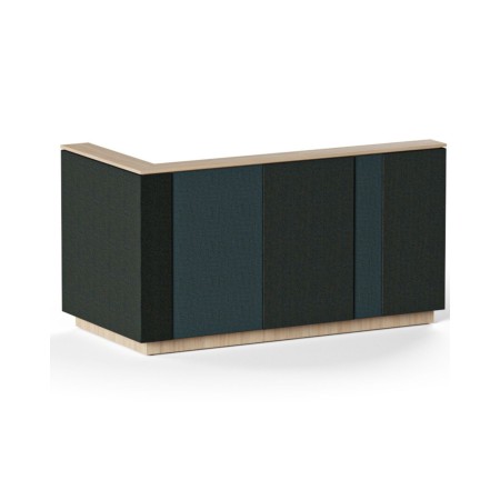 Comptoir d’accueil DOMINO en angle avec façade composée de panneaux décoratifs contrastés.