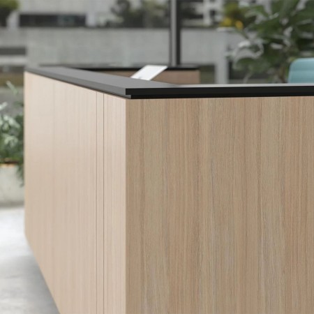 Banque de réception ICE avec plateau noir et façade en bois clair design minimaliste.