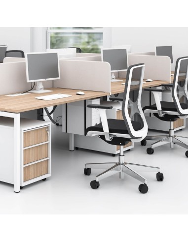 Écran latéral acoustique NOVA Fabric dans un espace de travail collectif à Genève.