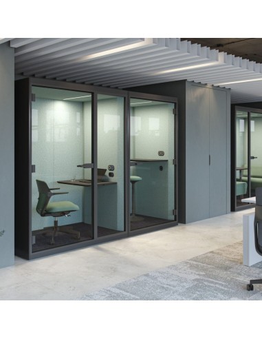 Cabines acoustiques SONUS S+ installées dans un open space moderne à Sierre.