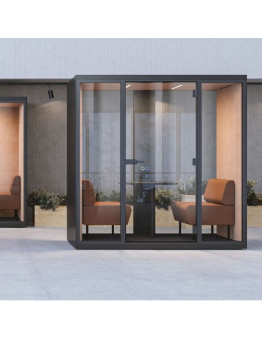 Cabine acoustique SONUS M installée dans un bureau moderne pour réunions confidentielles à Lausanne.