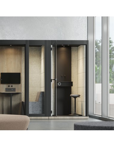 Cabine acoustique individuelle SILENT ROOM S installée dans un bureau partagé à Fribourg.