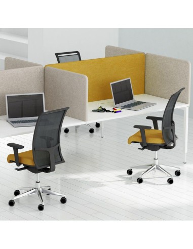 Chaise ergonomique DIVA installée dans un espace de travail collaboratif moderne à Lausanne.