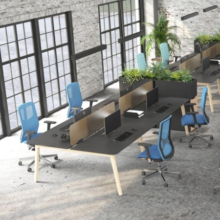 Chaise de bureau ergonomique WIND avec soutien lombaire installé dans un bureau à Aigle.