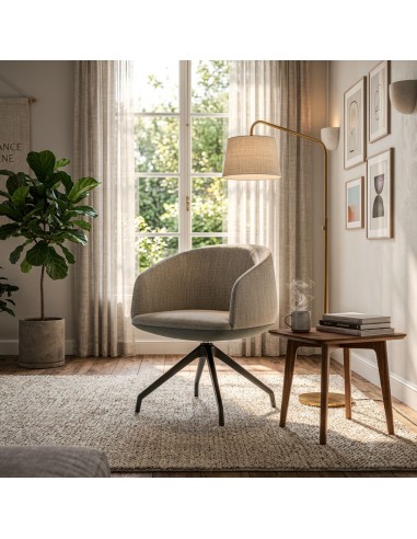 Fauteuil KOPA avec base pyramide dans un espace lounge à Lausanne.