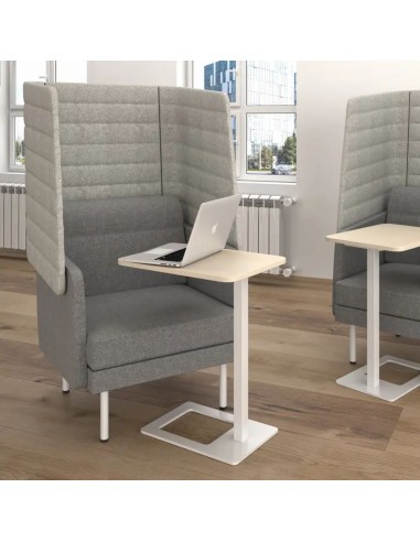 Fauteuil haut dossier ARCIPELAGO gris avec petite table en espace professionnel à Montreux.