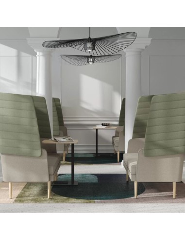 Canapés acoustiques ARCIPELAGO aménagés dans un espace collaboratif moderne avec zones de réunion à Bâle.