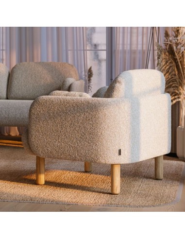 Fauteuil lounge MYAMI 4 pieds en frêne massif pour espaces professionnels dans un bureau lumineux à Genève.