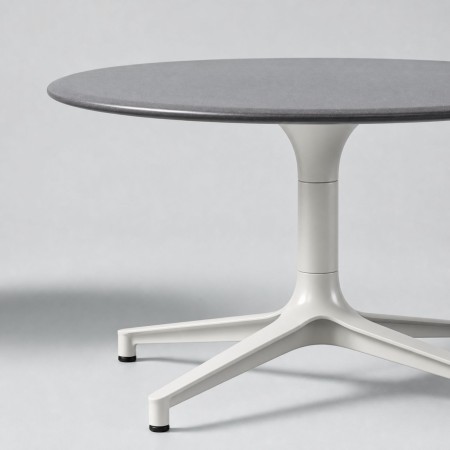 Table basse moderne grise BOTANY avec pied central en métal.