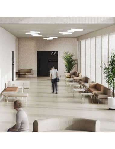 Fauteuil LINJE LE 401 installé dans un espace d'attente professionnel contemporain à Neuchâtel.