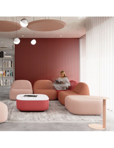 Fauteuils modulables poufs Jelly colorés installés dans un espace détente design à Zürich.